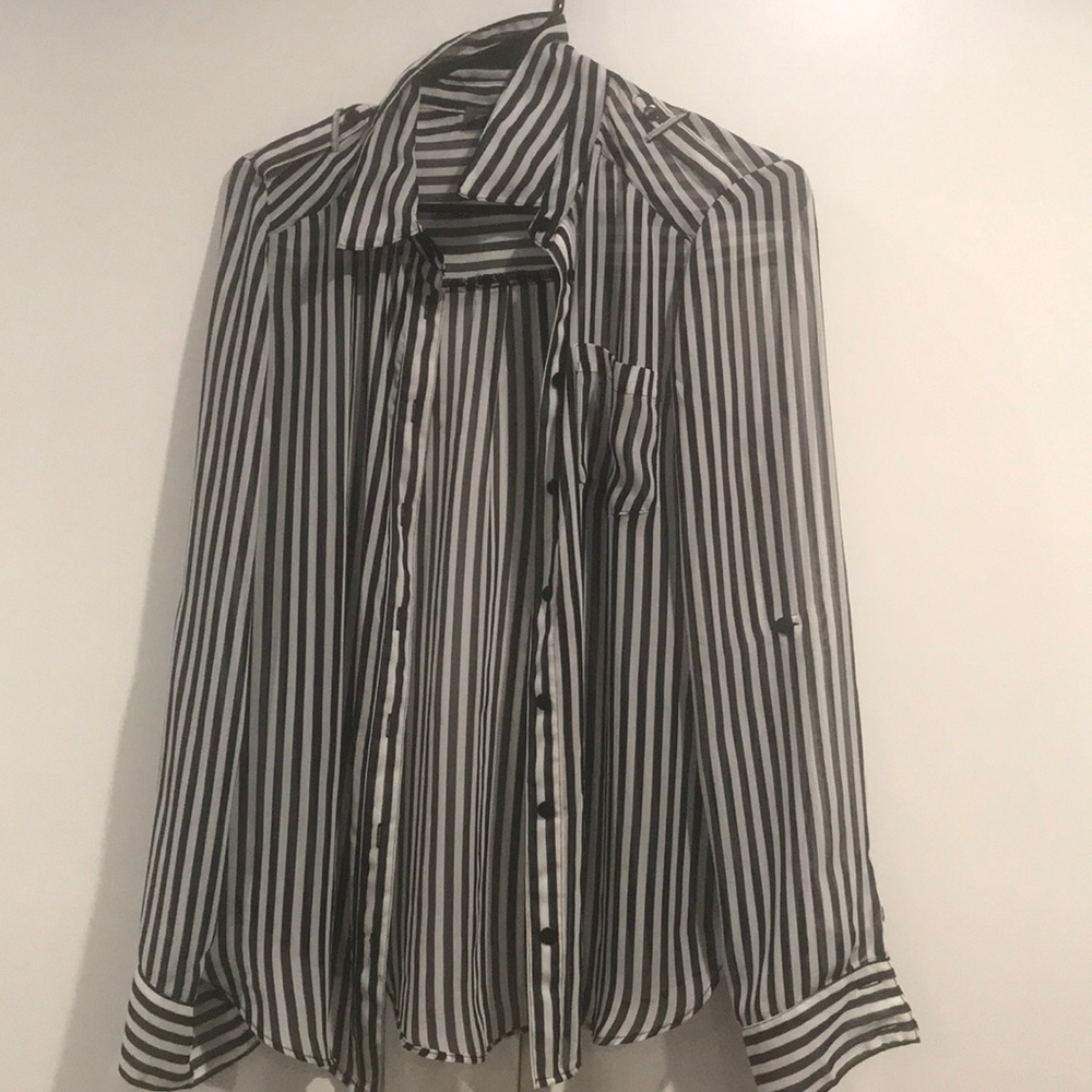 Black and white striped shirt. Long sleeve